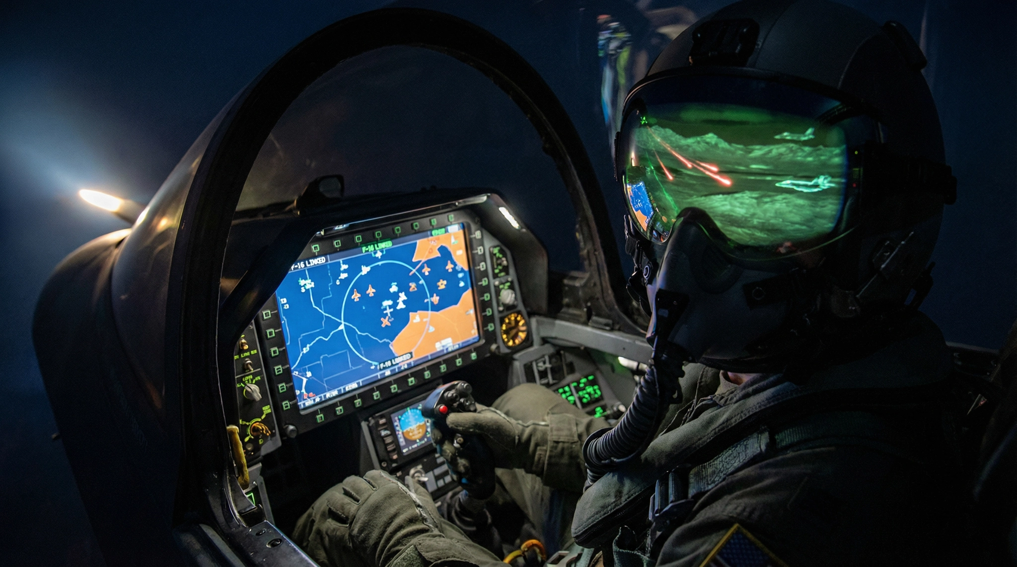F-35 pilot wearing helmet with DAS display active in cockpit.